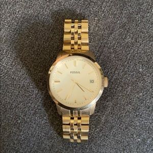 Gold fossil watch